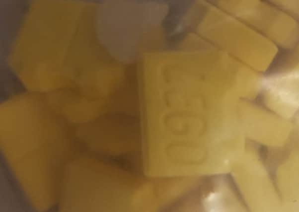 The yellow brick-like tablets were stamped with the 'Lego' brand.