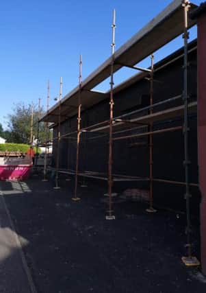 The scaffolding belonging to DB Scaffolding had to be removed at short notice after the company was warned to leave the Ardoyne for its own safety.