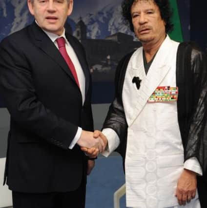Then prime minister Gordon Brown meeting Col Gaddafi at the G8 Summit in LAquilla in 2009