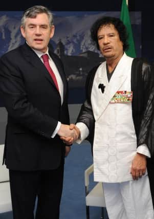 Then prime minister Gordon Brown meeting Col Gaddafi at the G8 Summit in LAquilla in 2009