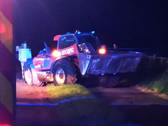 The scene of a serious accident involving a car and a telehandler on the Quilly Road near Coleraine