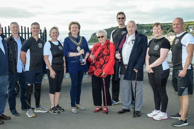Leonard Lawson, chair of Down Coastal Rowing Association, Roy McAllister, chair Antrim Coast Rowing Association, WCRC members alongside the Mayor, Cllr Maureen Morrow and Jean and John Kelly, former owners of the Golden Dawn cafe.
