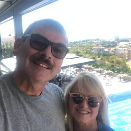 Ivan and Anne Cobb from Dromore, Co Down believe they got the last Thomas Cook flight from Belfast on Sunday night and are now waiting to find out what replacement flight they will be getting home.