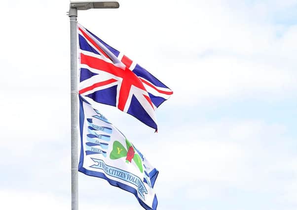 A consultation into the flying of all flags and banners in Belfast is to be held