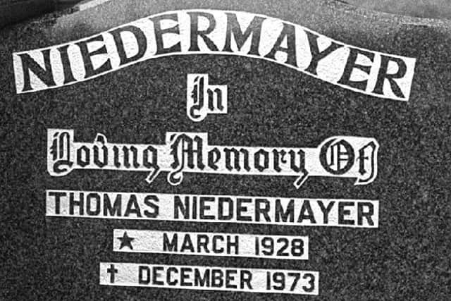 The headstone on the Dunmurry grave of murdered German industrialist Thomas Niedermayer