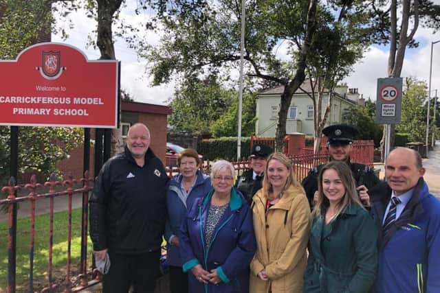 Carrickfergus Road Safety Committee has welcomed the new measures on the Belfast Road. Pictured are: (back) Joanne Campbell and Chris Shaw, PSNI; (front) David Hilditch MLA, Isobel Day, Beryl McKnight, Jenni Miller, principal of Carrickfergus Model , Cllr Cheryl Johnston and Roy Beggs MLA.