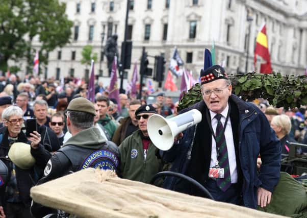 Lord Blencartha speaks to demonstrators in Parliament Square, London as part of a 'Rolling Thunder' protest for Soldier F.