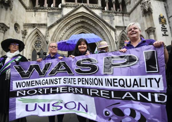 Campaigners outside the Royal Courts of Justice in London, ahead of a ruling on a case brought by campaigners who argue changes to the state pension age have unlawfully discriminated against women born in the 1950s. Photo credit: Kirsty O'Connor/PA Wire