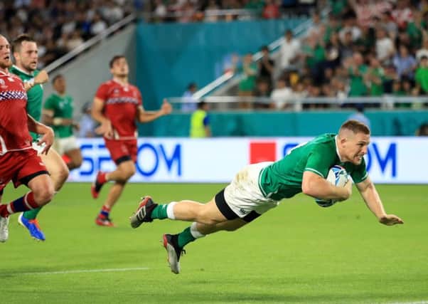 Ireland's Andrew Conway scores his side's fourth try of the game during the 2019 Rugby World Cup Pool A match at the Kobe Misaki Stadium, Kobe City. PA Photo. Picture date: Thursday October 3, 2019. See PA story RUGBYU Ireland. Photo credit should read: Adam Davy/PA Wire. RESTRICTIONS: Editorial use only. Strictly no commercial use or association. Still image use only. Use implies acceptance of RWC 2019 T&Cs (in particular Section 5 of RWC 2019 T&Cs) at URL: bit.ly/2o5ah46