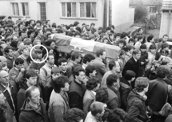 Willie Carlin (circled) in 1985 in the funeral cortege of an IRA man shot dead by the SAS in Strabane. Martin McGuinness is among those carrying the coffin