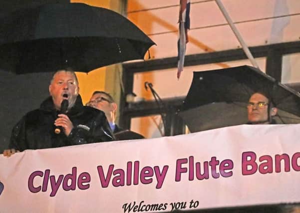 Sammy Wilson MP speaking at a rally in Larne in support of the Clyde Valley Flute Band