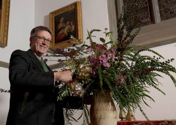 Florist Shane Connolly arranges flowers in the chapel at Clandeboye Estate during his visit to the Aspects 2019 festival.
Photo Laura Davison/Pacemaker Press