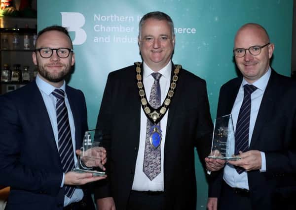 Conor Donnelly and Darragh McCarthy, FinTrU pictured with John Healy, President of Northern Ireland Chamber of Commerce and Industry