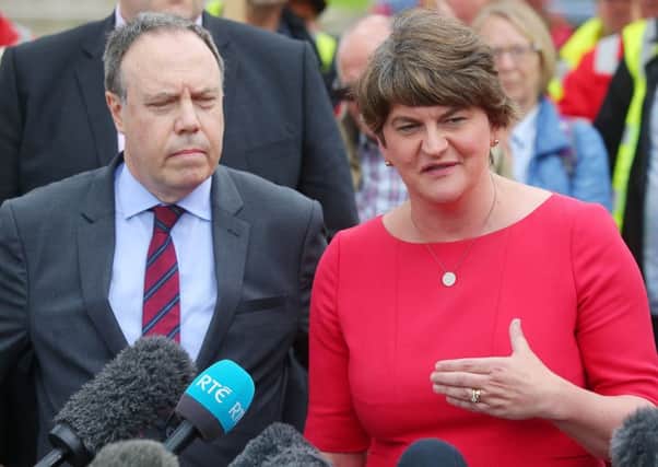 DUP leader Arlene Foster and Nigel Dodds speaking to the media after the prime minister's recent visit to Northern Ireland