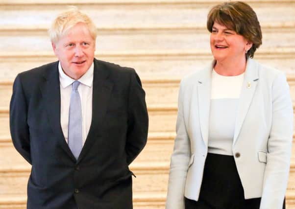 Boris Johnson and the DUP leader Arlene Foster are accused of putting Northern Irelands status in the UK up for negotiation