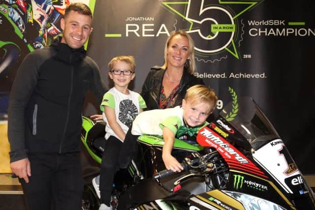 Family man Jonathan Rea with his wife Tatia, and sons, Jake and Tyler at his homecoming party at Belfast International Aiport on Wednesday, October 2.