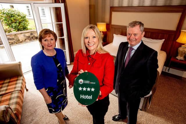 (L to R) are Catherine and Eugene McKeever, Managing Directors of McKeever Hotel Group with Caroline Adams from Tourism NI.