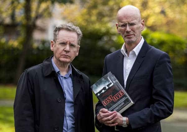 Dermot Lavery (left) and Michael Hewitt of Doubleband Films who directed, Lost Lives, a cinematic film inspired by the book of the same name, which was written over seven years by five journalists, that records the circumstances of every single death in the Troubles. PA Photo: Liam McBurney/PA Wire