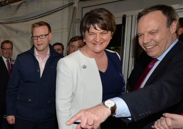 DUP Leader Arlene Foster at an election count in 2016 with then special adviser John Robinson (left of picture) and Nigel Dodds