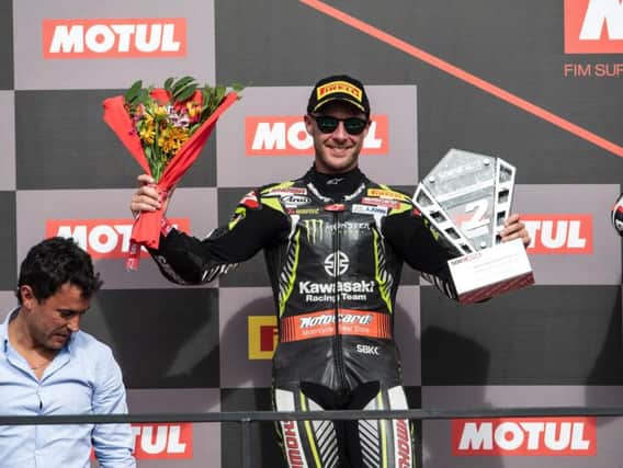 Jonathan Rea on the rostrum in Argentina after Saturday's controversial race.