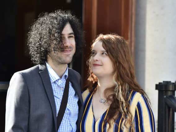 Emma DeSouza pictured with her husband Jake outside the Royal Courts of Justice in Belfast.