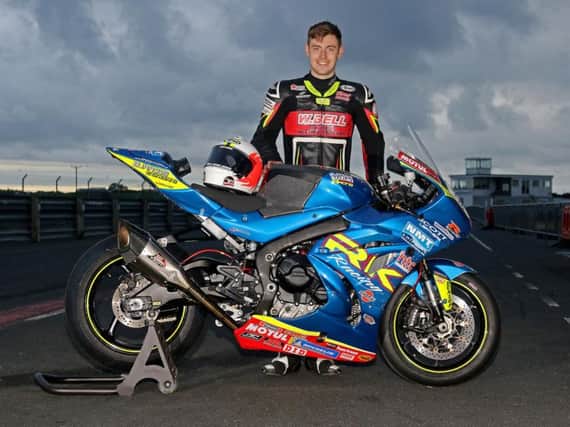 Jason Lynn with the ex-Burrows Engineering Racing Suzuki he will ride at the Sunflower Trophy meeting and in next season's Ulster Superbike Championship. Picture: Derek Wilson/Pacemaker Press.
