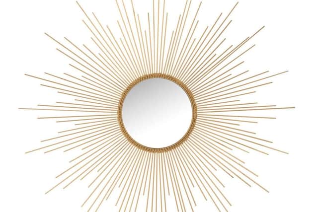 Undated Handout Photo of Gold Sunburst Mirror, £135, Audenza. See PA Feature INTERIORS Bedroom. Picture credit should read: Audenza/PA. WARNING: This picture must only be used to accompany PA Feature INTERIORS Bedroom. WARNING: This picture must only be used with the full product information as stated above.