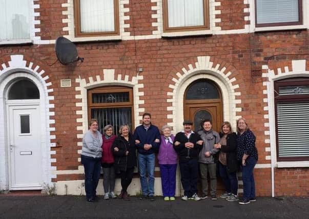 The Thibodeau family find their mother's old house in Belfast