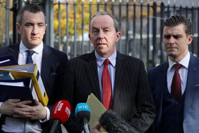 Peter Corrigan (centre), solicior for Ivor Bell, speaks to the media outside Belfast Crown Court following the trial of the facts into two charges of soliciting the murder of Jean McConville against veteran republican Ivor Bell