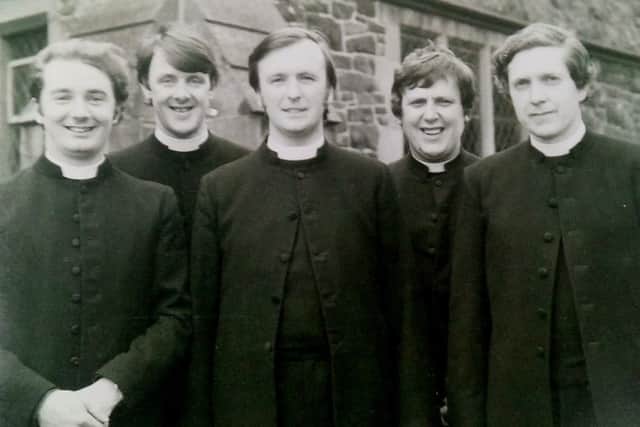 Jim (centre) and fellow colleagues at Ordination in Bangor in 1973