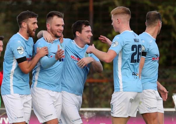 Ryan Harpur (second left) celebrates his weekend goal for Ballymena United against Crusaders. Pic by Pacemaker.