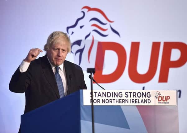 Boris Johnson delivers his speech during the Democratic Unionist Party annual conference at the Crown Plaza Hotel on November 24, 2018. (Photo by Charles McQuillan/Getty Images)
