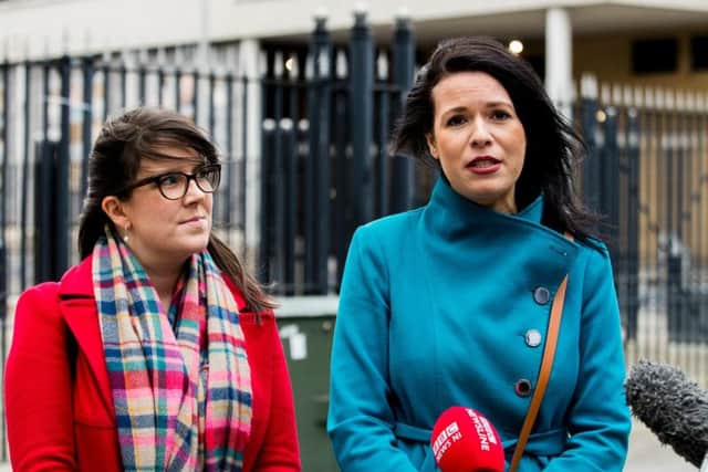 Grainne Teggart (right) from Amnesty International with colleague Anna Hughes outside Belfast Crown Court after a woman from Northern Ireland who was prosecuted for buying abortion pills online for her teenage daughter has been formally acquitted after landmark reform of the region's laws