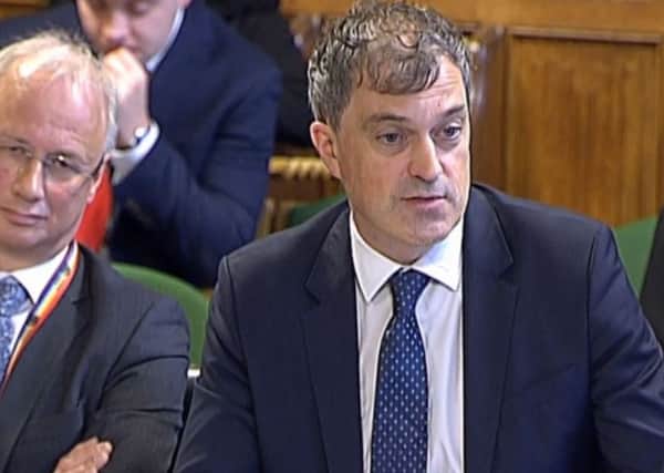 Northern Ireland Secretary Julian Smith appearing before the Northern Ireland Affairs Select Committee in the House of Commons, London on Wednesday, with, left, Sir Jonathan Stephens, permanent secretary of the NIO. Photo: PA Wire