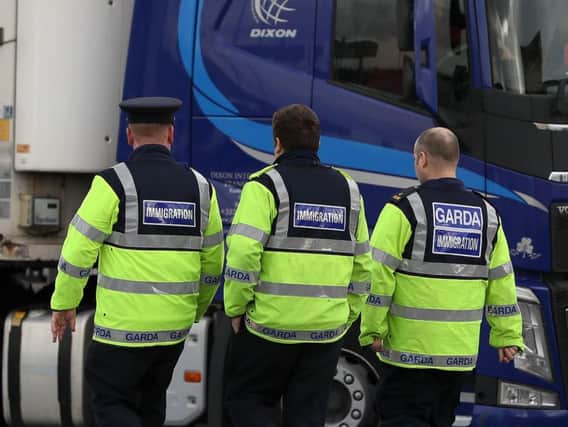 Garda immigration officers at Dublin Port, which is thought to have been used by the lorry in which 39 bodies have been found on an industrial estate in Essex. (Photo: Brian Lawless/PA Wire)