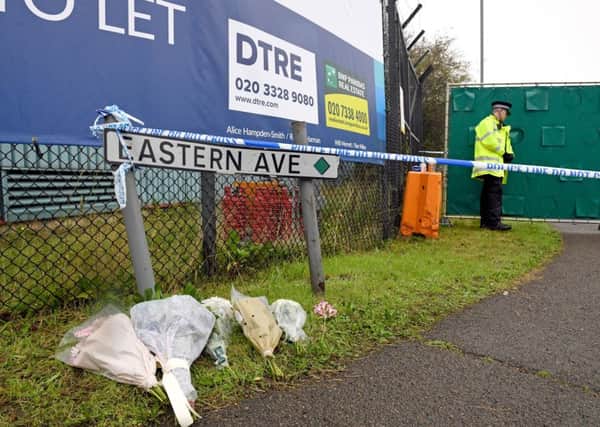 Floral tributes at the Waterglade Industrial Park in Grays, Essex, after 39 bodies were found inside a lorry on the industrial estate. PA Photo. Picture date: Thursday October 24, 2019. The vehicle driver, named in reports as 25-year-old Mo Robinson from Portadown in Co Armagh, Northern Ireland, is being held by Essex police on suspicion of murder. See PA story POLICE Container. Photo credit should read: Stefan Rousseau/PA Wire