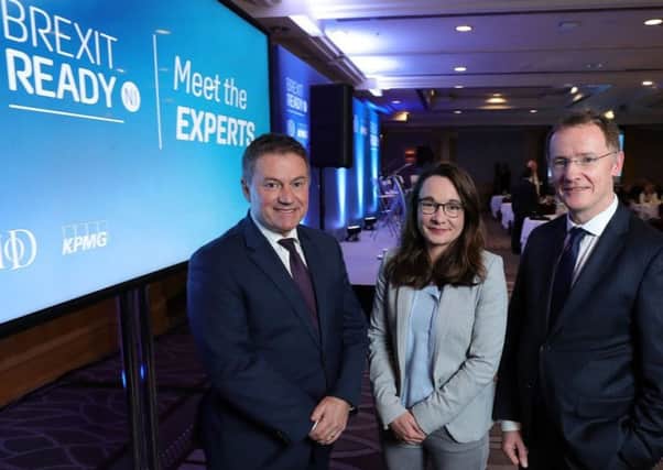 Gordon Milligan, IoD NI Chairman, left, joins Dr Katy Hayward, QUB, and Frankie Devlin, KPMG at the business organisations Meet the Experts lunch held at Hilton Belfast.