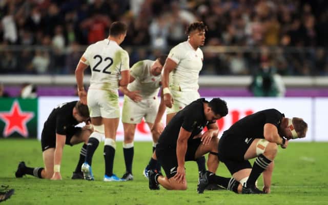 New Zealand players appear dejected during their semi-final defeat to England. Photo credit: Adam Davy/PA Wire