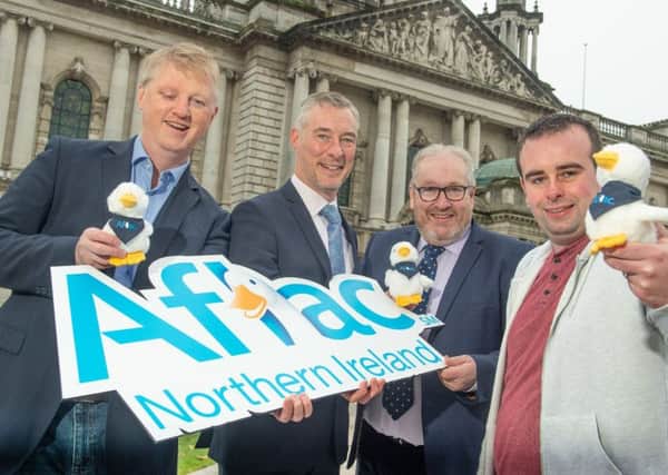 (l-r) Mark McCormack, Head of Technology at Aflac Northern Ireland; Graeme Wilkinson, Director of Skills at DfE; Damian Duffy, Director of Development at Belfast Met; and Ruairí Mahon, Senior Pega Developer at Aflac NI.