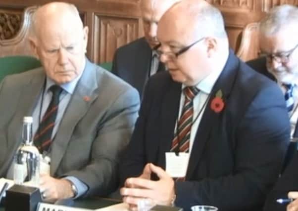 Raymond White (left) and Mark Lindsay giving evidence to the NI Affairs Committee at Westminster