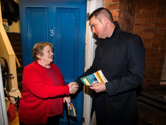 Sinn Fein's John Finucane meeting with Christine Huddleston while canvassing in north Belfast ahead of the prospects of an upcoming election in December. (Photo: Liam McBurney/PA Wire)