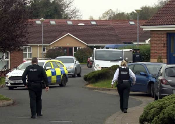 Police officers at the scene of the murder at Enterprise Court in Bangor. Pic: Presseye/Stephen Hamilton