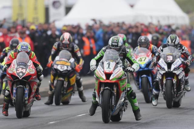 Glenn Irwin (1) leads Alastair Seeley (34) off the line in the Superbike race at the North West 200 in May.
