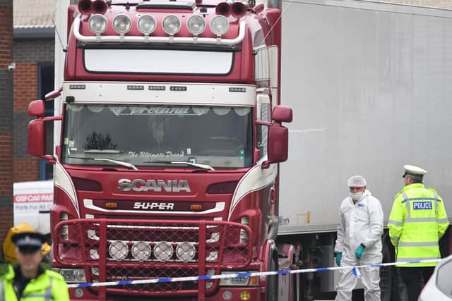 The 39 dead men and women discovered inside this refrigerated lorry container could have been trafficked through Russia, say police in Vietnam. (Photo: Stefan Rousseau/PA Wire)