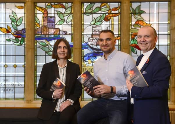 Gladys Ganiel (author), Jamie Yohanis (author) pictured at the launch with the Presbyterian moderator Rev William Henry at Assembly Buildings in Belfast.
 Picture By: Arthur Allison/ Pacemaker.