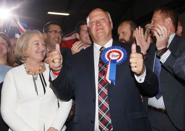 David Simpson pictured celebrating after he wins the seat at the election count for Upper Bann in 2017