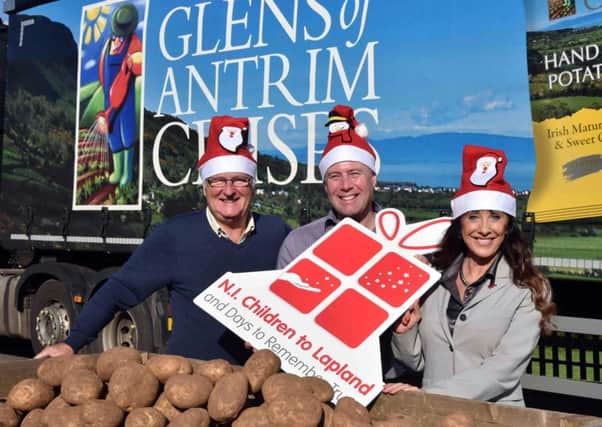(l-r) Colin Barkley, chair, NI Children to Lapland and Days To Remember Trust; Michael McKillop, Managing Director, Glens of Antrim Potatoes; and Fiona Williamson, the charitys co-ordinator.