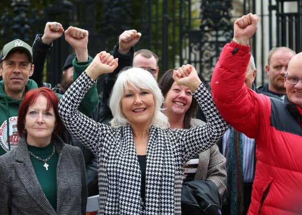 Campaigners celebrate last week after Appeal Court judges ruled the Stormont Executive Office has the power to compensate survivors of institutional abuse in NI.