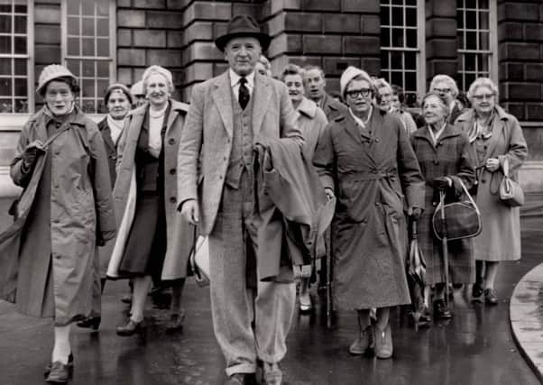 Richard Hayward leading a party from Belfast Naturalists Field Club to Sligo from Belfast City Hall, Easter 1961