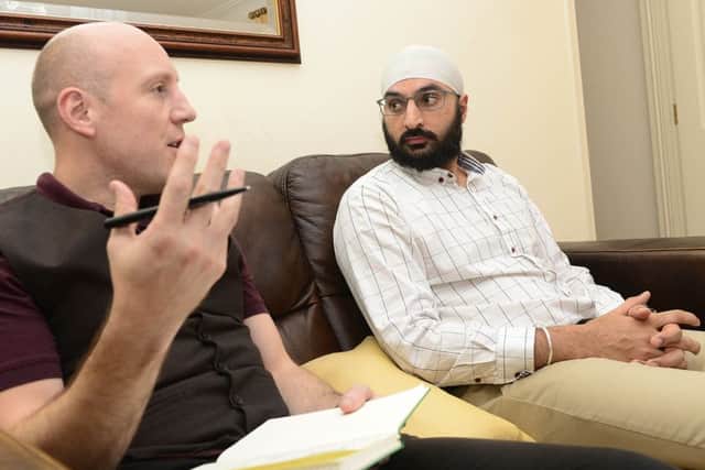 The News Letter's Graeme Cousins pictured doing a interview with cricketer Monty Panesar. Picture by Arthur Allison/ Pacemaker.